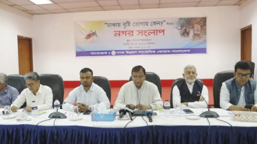 DSCC administrator speaks at a city dialogue titled “Why does rain cause suffering in Dhaka?” Photo: Star