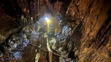 Rescuers work their way into the cave system in Xaisomboun, Laos. Photo: Reuters