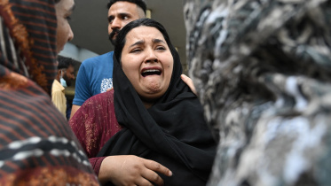AFP__20260826__C6HJ863__v1__MidRes__PakistanHospitalFire.jpg