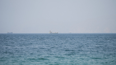 Vessels near the Strait of Hormuz, as seen from Musandam, Oman, August 6, 2026. Photo: Reuters