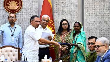 raincoat distribution for tea workers in Bangladesh
