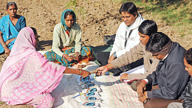 Microfinance was designed to provide financial services to low income people typically excluded from traditional banking. Photo: AFP