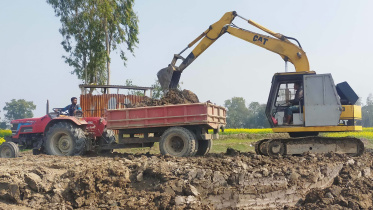 Topsoil removal brick making.jpg