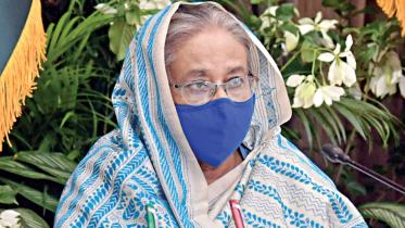 Sheikh Hasina masks.jpg