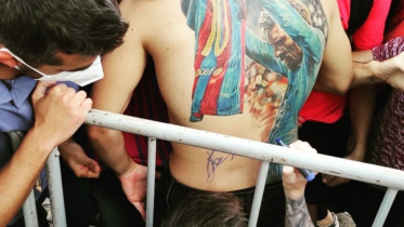Messi and Brazilian fan (1).jpg