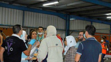 Refugees waiting to meet their families