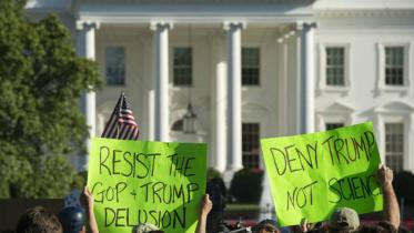 Americans protest President Trump's withdrawal from the Paris.jpg