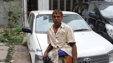 A devastated Ataur Mia at Dhaka Medical College Hospital