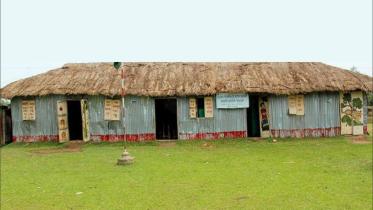Classes hampered thatched house.jpg