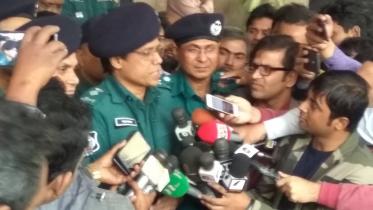 A delegation of top police officials briefing journalists after visiting Jatiya Oikyafornt Convener Dr Kamal Hossain 