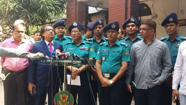 Dhaka Metropolitan Police Commissioner Asaduzzaman Miah addresses a press briefing