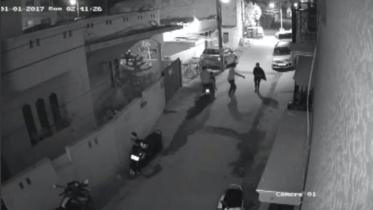 Two men on a scooter assault a woman