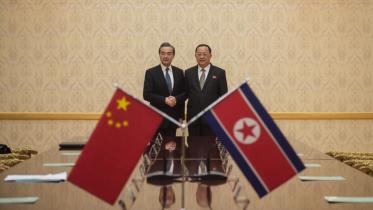 kim n korea china.jpg