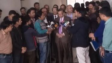 Law Minister Anisul Huq talks to reporters after attending the inauguration