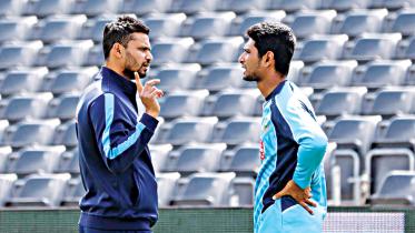 Mashrafe Bin Mortaza and Mahmudullah Riyad