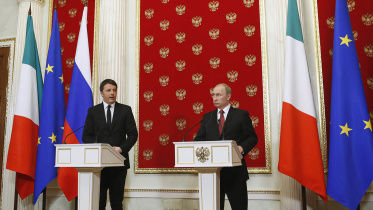 Italian Prime Minister Matteo Renzi and Russian President Vladimir Putin