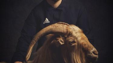 Messi-with-Goat..jpg