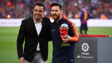 Messi and Xavi.jpg