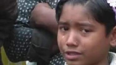 Nilphamari, Kazoli Rani Roy in tear as headmaster takes back text books.jpg