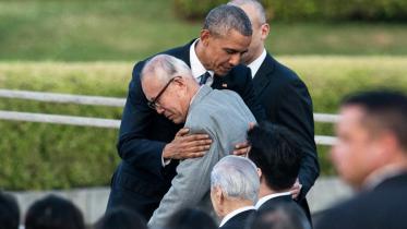 Barack Obama hugs Shigeaki Mori