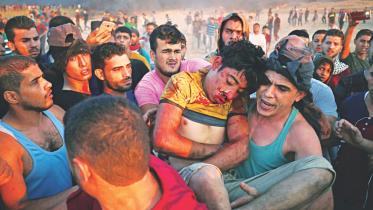 Palestinian protesters injured.jpg