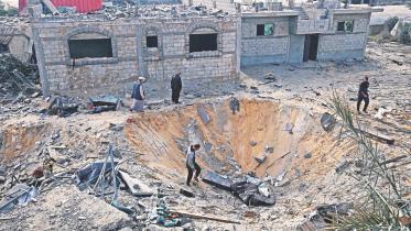 Palestinians inspect.jpg