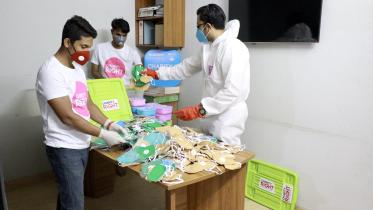 Picture 1a - Charity Right Bangladesh  volunteers prepare safety kits for underpriveledged communities_Photo Courtesy.jpg
