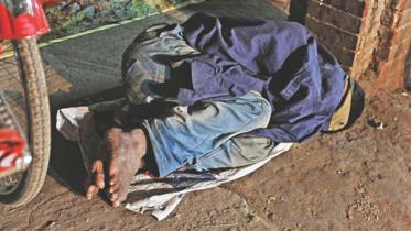 poor man on the pavement