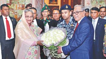 president greets hasina.jpg