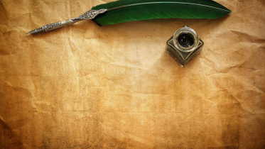 Quill pen and ink well resting.jpeg