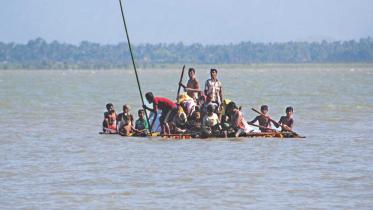 Rohingyas floating on makeshift...