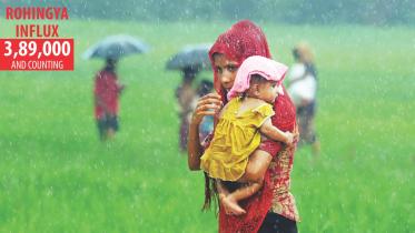 rohingyas in rain.jpg