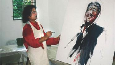 Shahabuddin Ahmed works on a painting of Bangabandhu