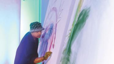 The artist 'performs' a painting