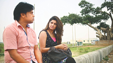 Tomar Poth'er Dhulite.jpg