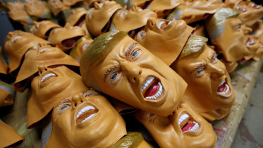 Rubber masks depicting US President-elect Donald Trump