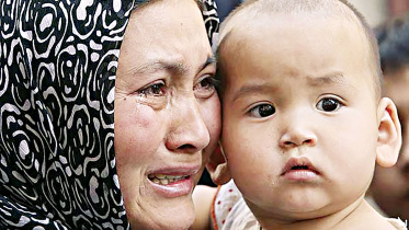 Uighurs-urge-probe-genocide.jpg