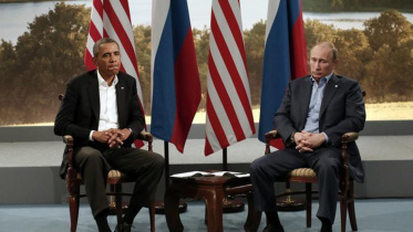 US President Barack Obama (L) meets with Russian President Vladimir Putin