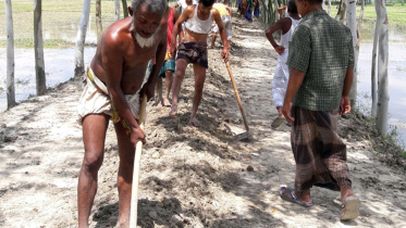 villagers repair road.jpg