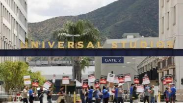 Hollywood writers try to strike a love match while picketing