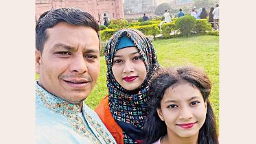 Saiful, his wife Riya and their daughter Angel