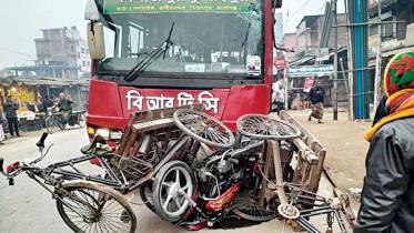 BRTC bus hits rickshaw in Dinajpur