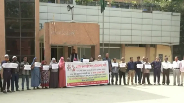 Workers form human chain at FDC demanding unpaid salary