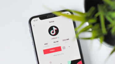 TikTok logo on phone