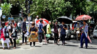 Students manage traffic in Dhaka in 2024