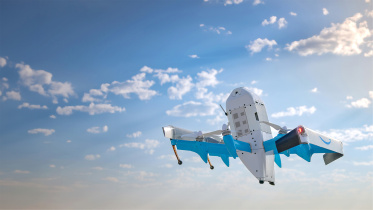 Amazon launches drone delivery service in US, signals potential for tech-driven logistics shift.