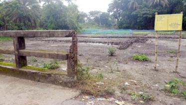 Mukteshwari river filled up and marked for sale.jpg