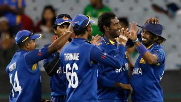 Sri Lanka's Lasith Malinga celebrates with team mates