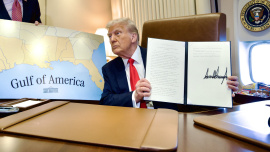 President_Donald_Trump_on_Air_Force_One_poses_next_to_a_map_of_the_Gulf_of_America_during_a_flight_to_New_Orleans_on_February_9,_2025.jpg