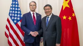 This handout photograph released by The Federal Department of Foreign Affairs or Swiss Foreign Ministry (FDFA) on May 14, 2025 shows US Treasury Secretary Scott Bessent (L) shaking hands with China’s Vice Premier He Lifeng during a meeting to discuss trade relations and tariffs, in Geneva, on May 10, 2025. Photo: AFP